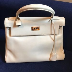 Hermès Kelly 28 vintage white with gold details